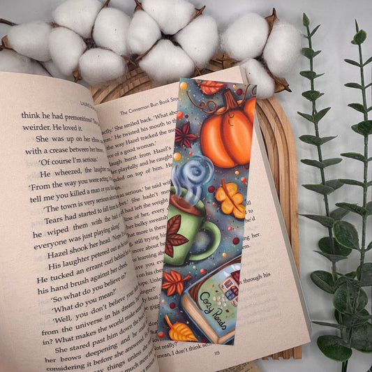 Cozy herfst boekenlegger met koffie/thee/chocomelk, pumpkin en boeken