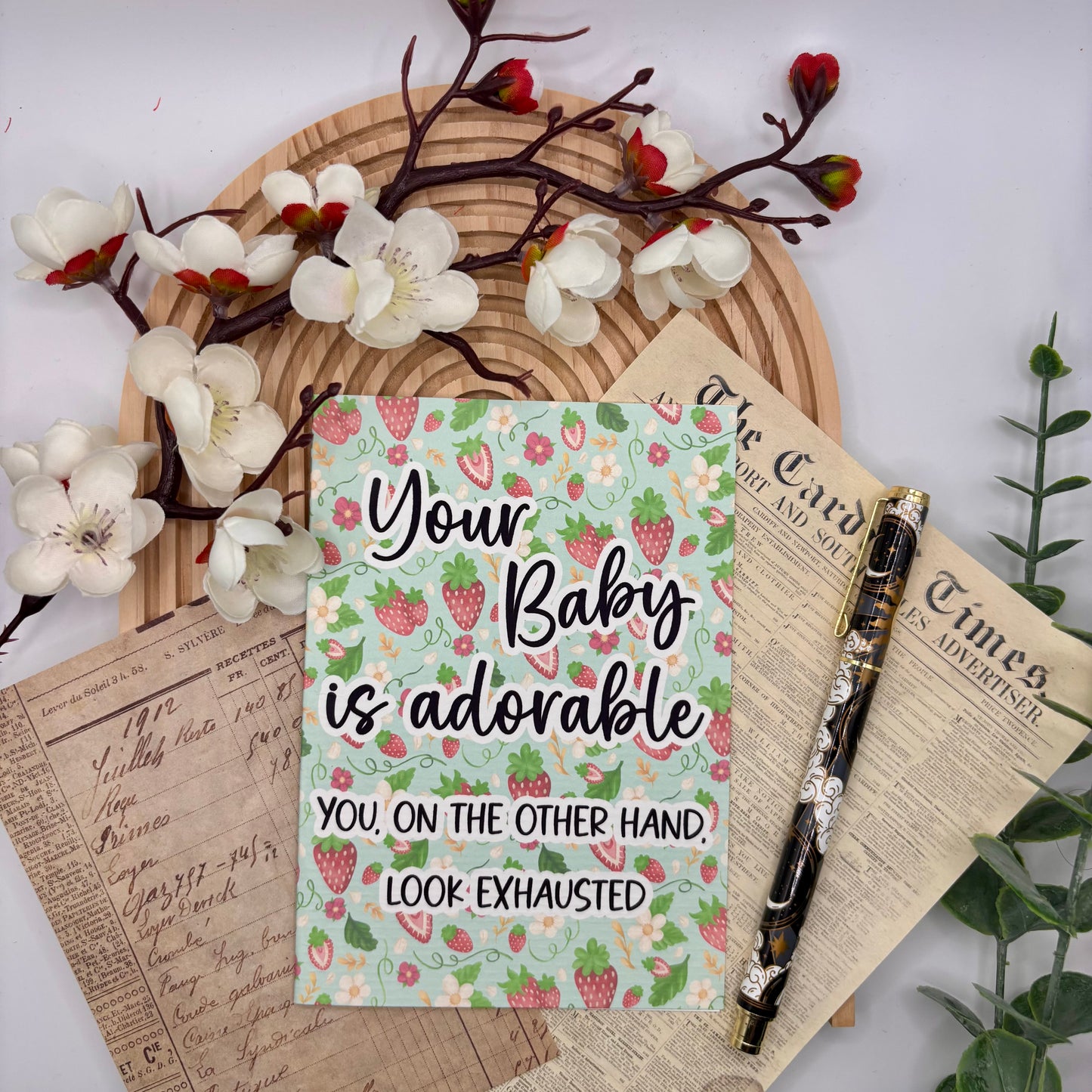 Wenskaart – Your Baby is Adorable… You Look Exhausted | Aardbeien Quote Kaart