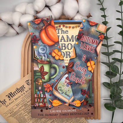 Beide kanten van de boekenlegger utumn leaves en cozy reads vormgegeven in herfst sferen.