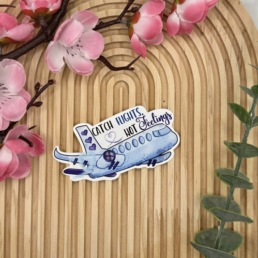 Die-cut sticker van vliegtuig met de quote Catch Flights, Not Feelings.